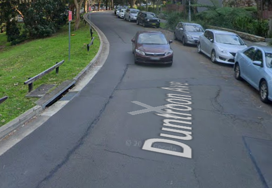 Cars parked cars on a street

AI-generated content may be incorrect.