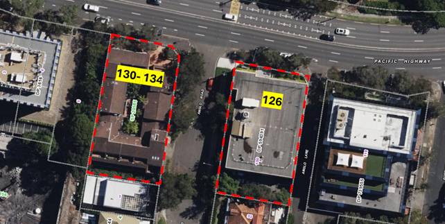 Aerial view of a city with buildings and roads
AI-generated content may be incorrect.