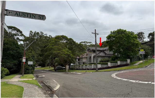 A street sign on a street corner

AI-generated content may be incorrect.