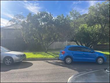 A blue car parked in a parking lot

AI-generated content may be incorrect.