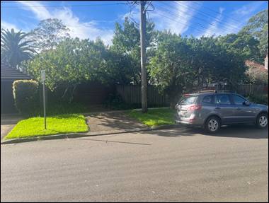 A car parked on the side of a road

AI-generated content may be incorrect.