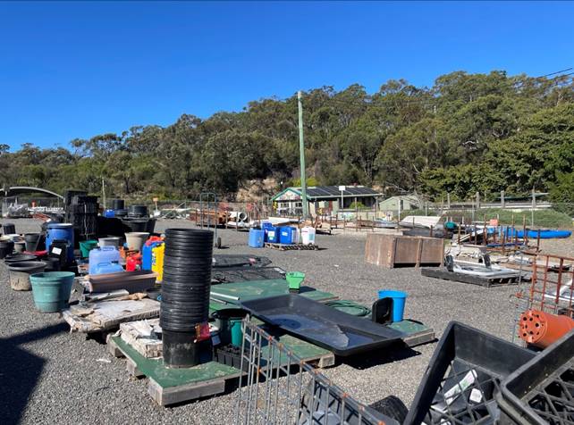 A group of objects on a gravel surface
AI-generated content may be incorrect.